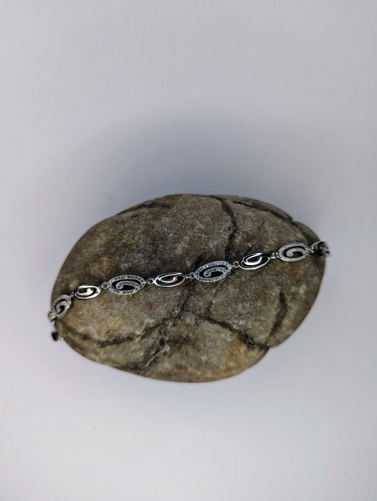 Sterling Silver Curling Simulated Diamond Bracelet